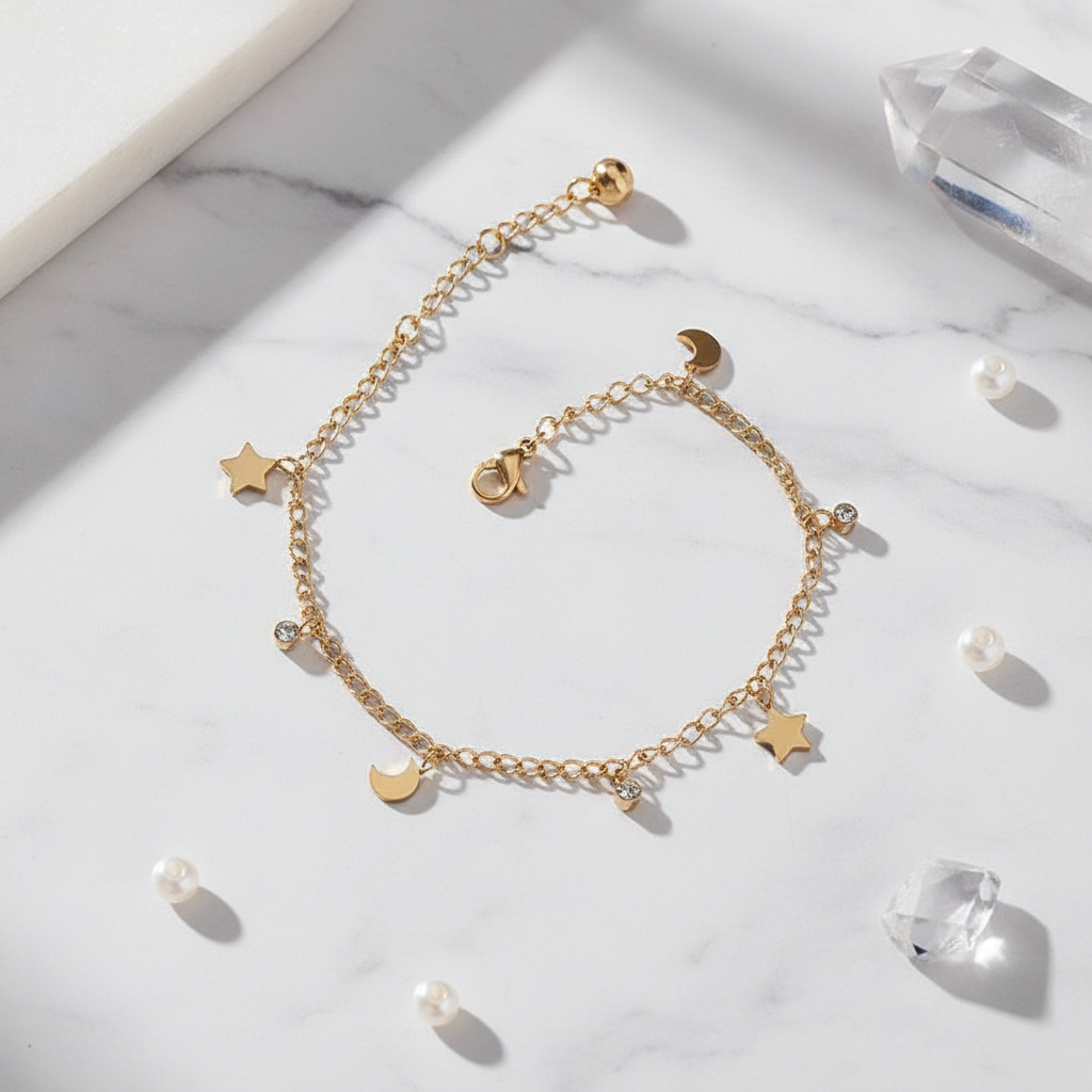 Gold star moon bracelet flatlay